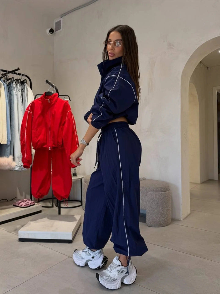 Women Short-Cut Windbreaker Set with Loose Track Pants and Contrast Piping Mune Fashion