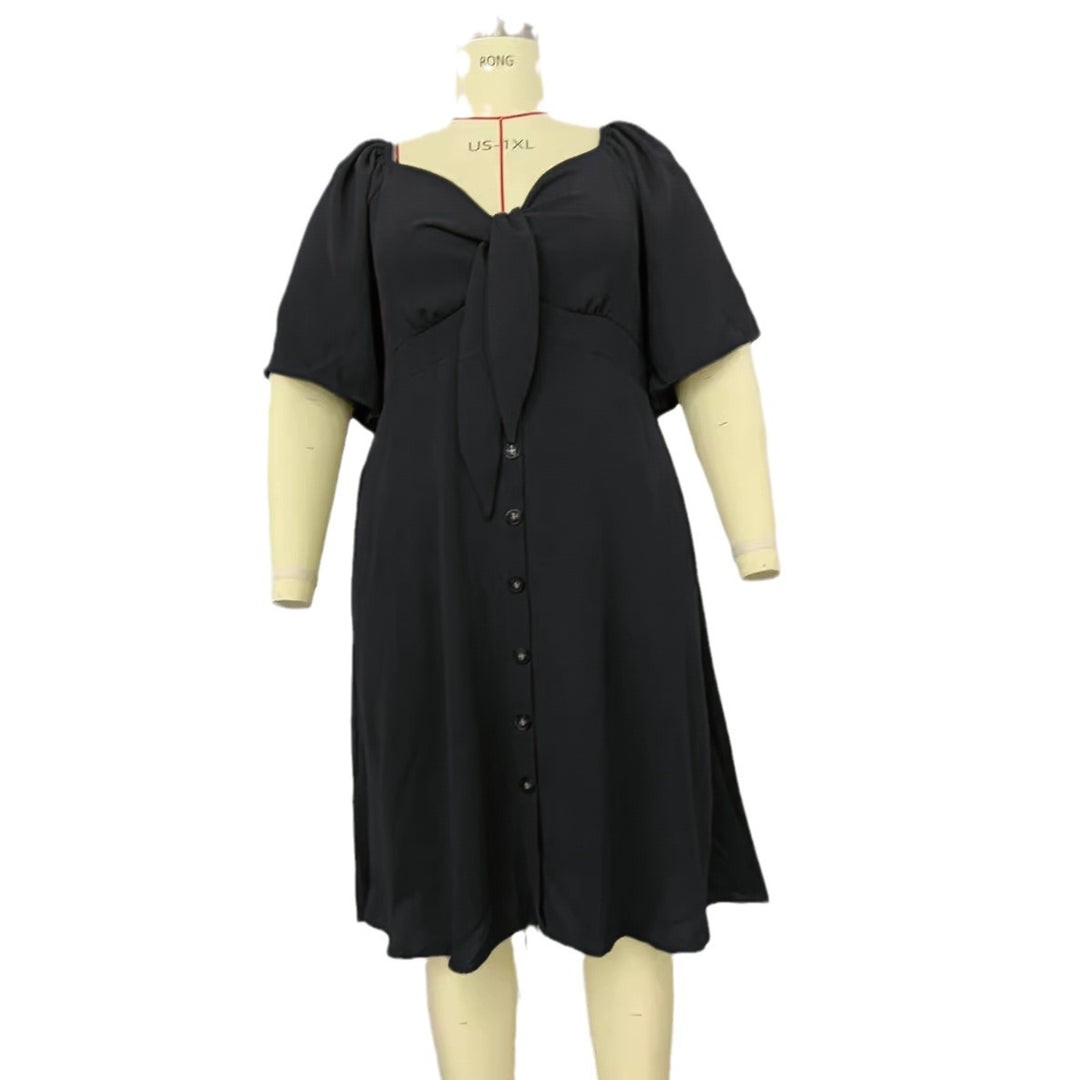 Women A-line midi dress with knot detail, puff sleeves and button placket Mune Fashion