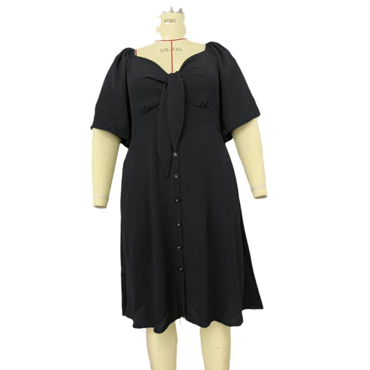 Women A-line midi dress with knot detail, puff sleeves and button placket Mune Fashion