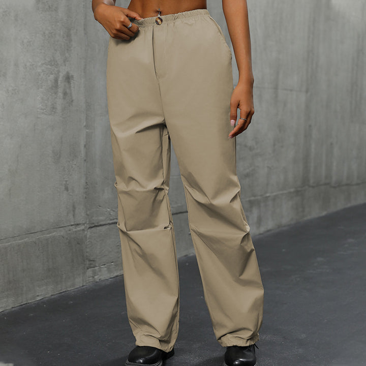 Women's loosely cut utility pants with high elastic waistband, drawstring hem & concealed button placket Mune Fashion