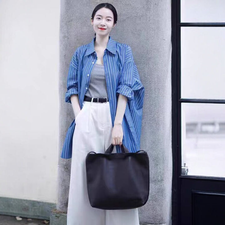 Women's longline shirt with pinstripes, oversized silhouette and extended hem Mune Fashion