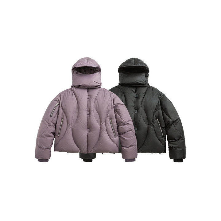 Unisex Short padded puffer jacket with high closing collar, voluminous hood and zippered pockets Mune Fashion