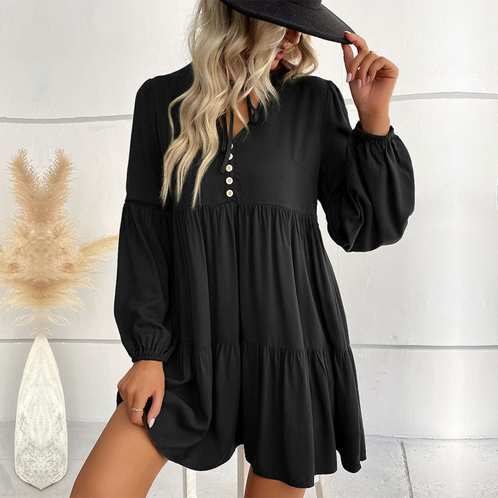 Ladies short-cut tiered babydoll dress with V-neck, button placket and balloon sleeves Mune Fashion