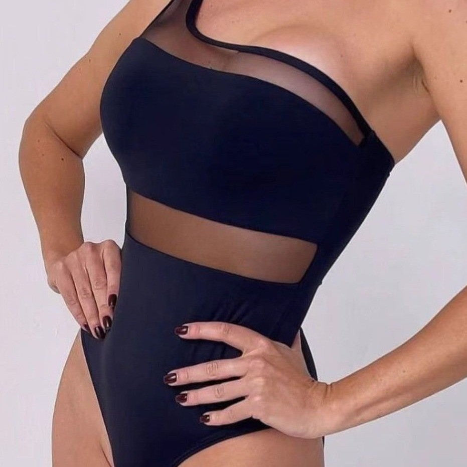 Women's one-piece swimsuit with asymmetrical cut and transparent accents Mune Fashion