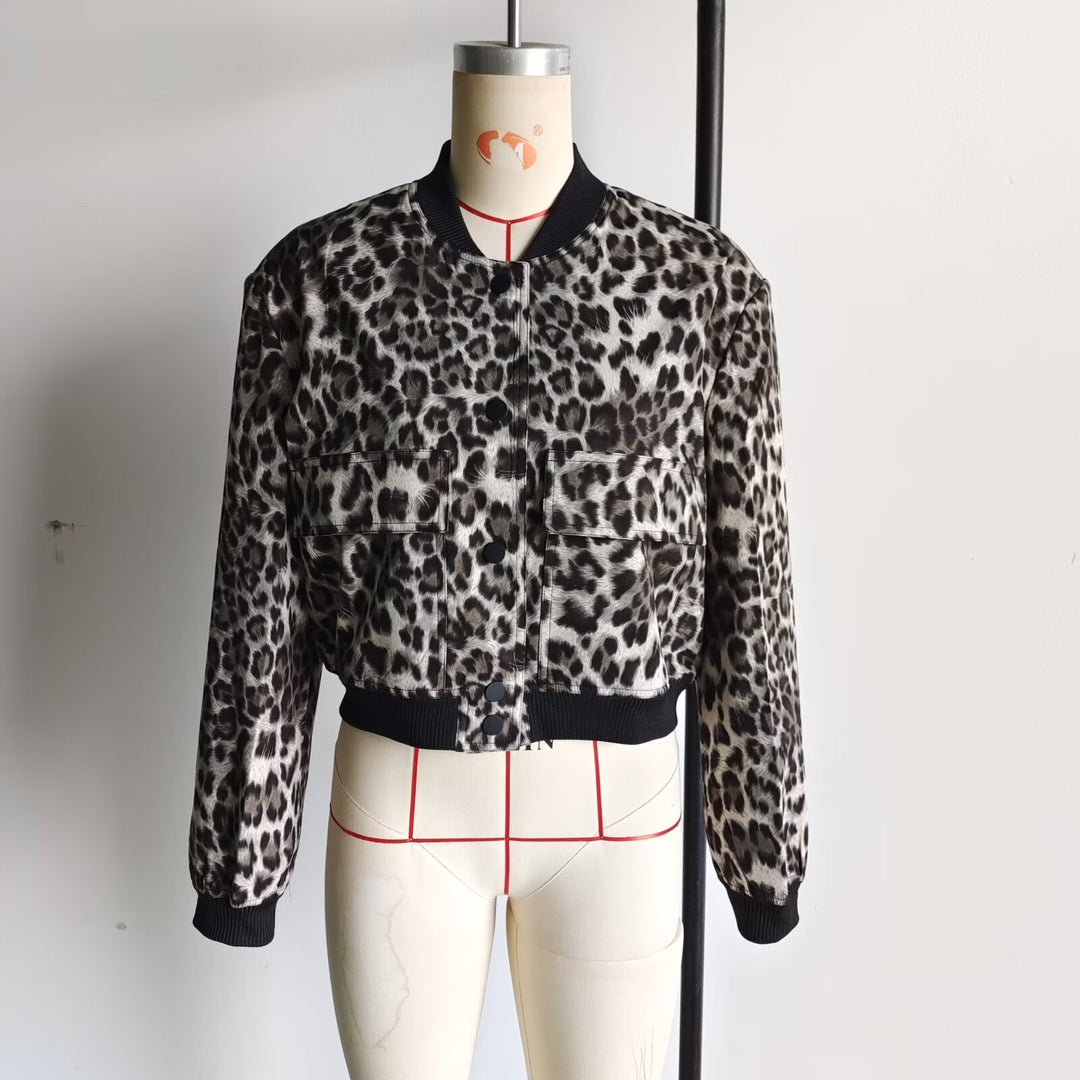 Women's short-cut bomber jacket with animal print, ribbed cuffs, patch pockets, and snap button closure Mune Fashion