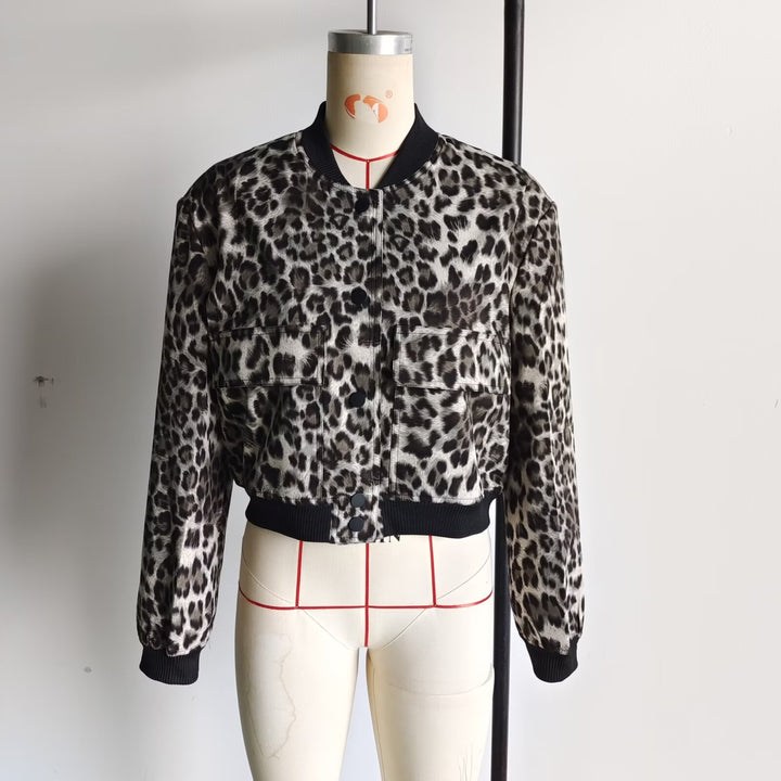 Women's short-cut bomber jacket with animal print, ribbed cuffs, patch pockets, and snap button closure Mune Fashion