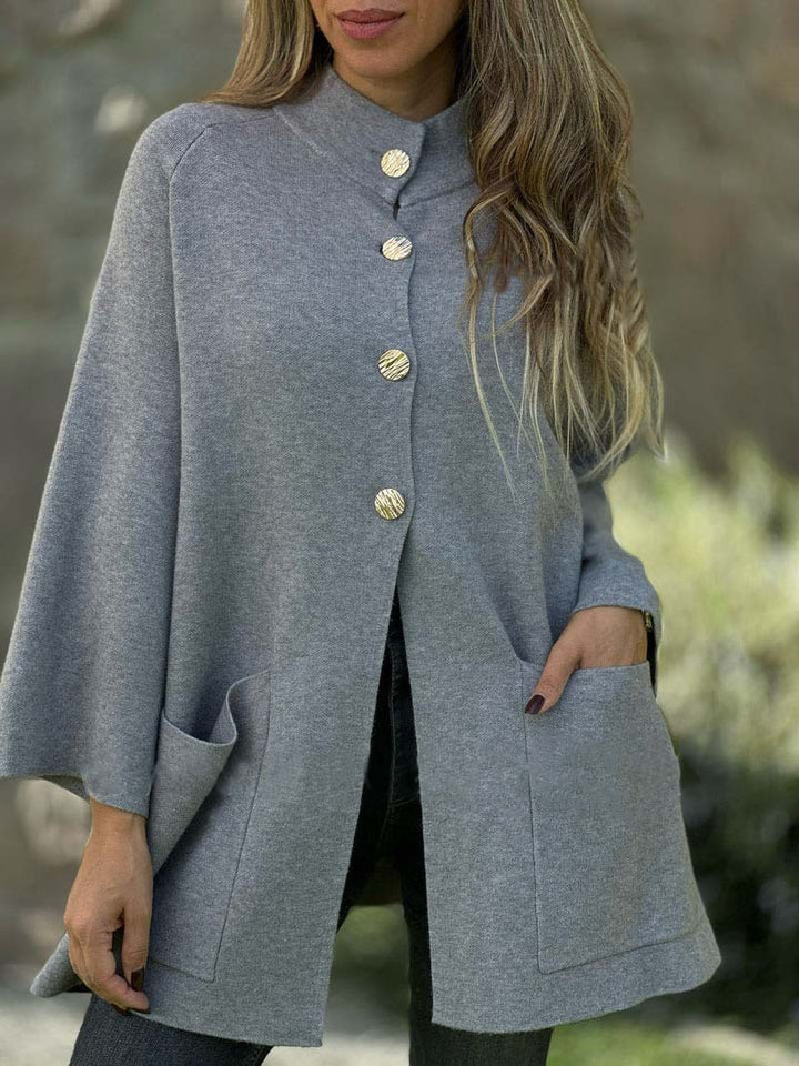 Women's Oversize Cape Cardigan with Stand-Up Collar, Patch Pockets, and Decorative Buttons Mune Fashion