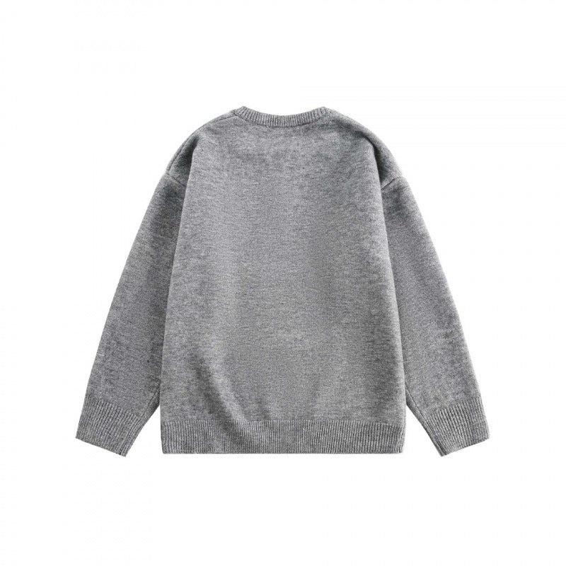 Unisex Boxy fine knit pullover with half Henley opening, round neck and ribbed finishes Mune Fashion
