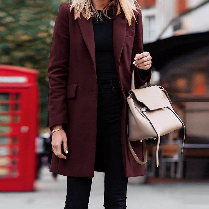 Women's tailored wool blend coat with a slim fit, lapel collar and concealed button placket Mune Fashion