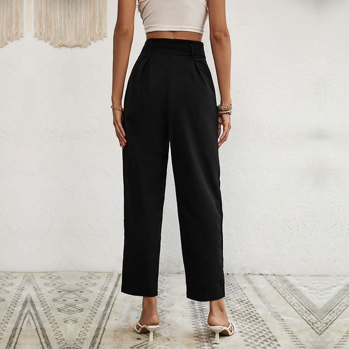 Ladies high-waisted paperbag trousers with tie belt, tapered leg and decorative button placket Mune Fashion