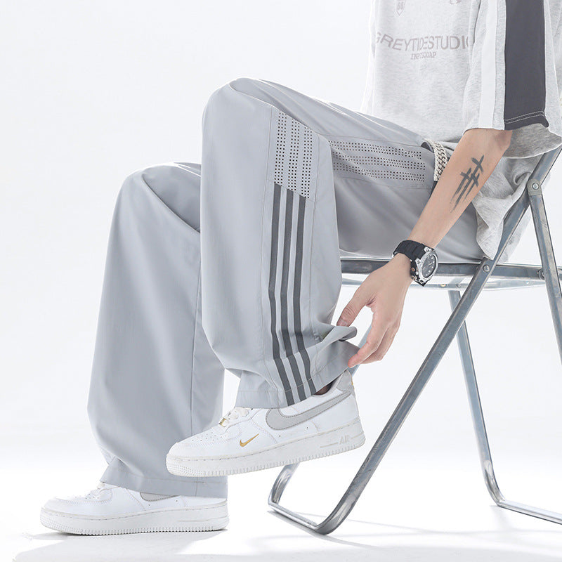 Men's sporty jogging pants with breathable inserts