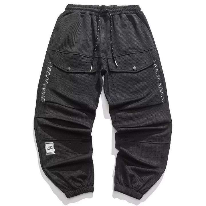 Men's wide cargo jogging pants with drawstring, flap pockets, and elastic cuffs Mune Fashion