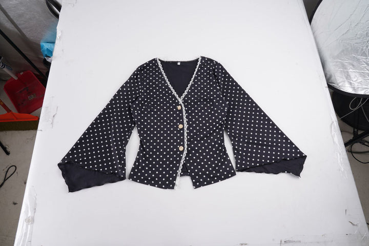Ladies polka dot blouse with V-neck, lace trim and flared ruffle sleeves Mune Fashion