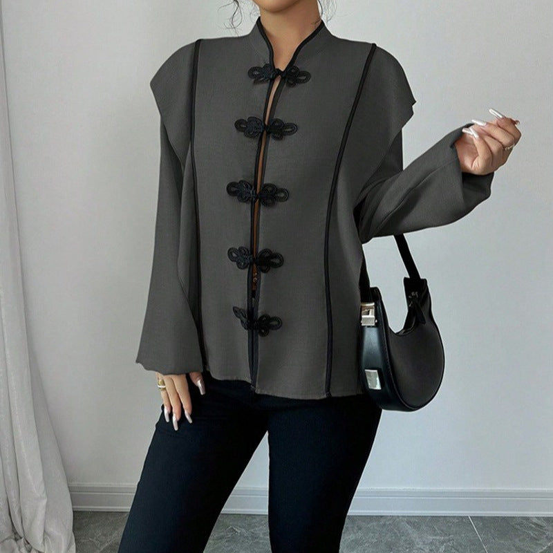Women's stand-up collar blouse with decorative knot closures and decorative piping Mune Fashion
