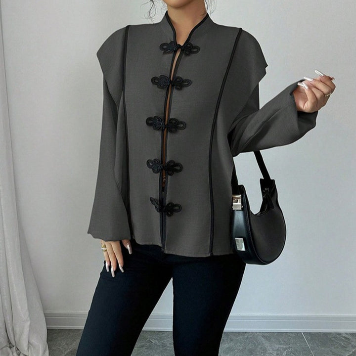 Women's stand-up collar blouse with decorative knot closures and decorative piping Mune Fashion