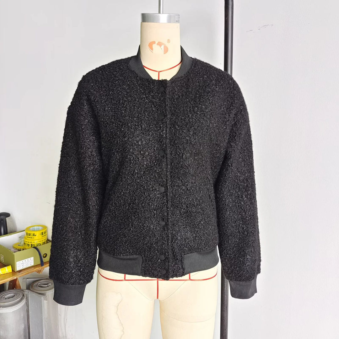 Ladies cozy teddy bomber jacket in college style with concealed snap button placket and integrated pockets Mune Fashion