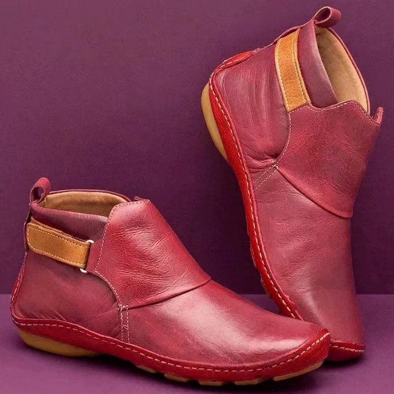 Women's ankle-high slip-on boots made of soft synthetic leather with adjustable hook-and-loop strap and hand-stitched moccasin seam Mune Fashion