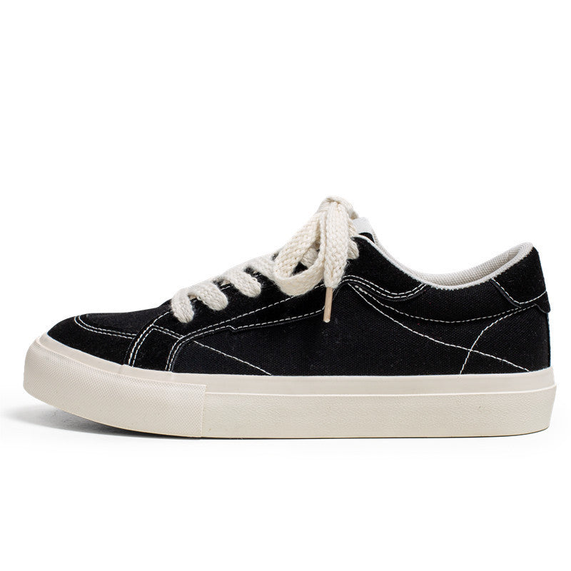 Unisex casual canvas low-top sneaker with contrasting decorative stitching and padded platform sole Mune Fashion