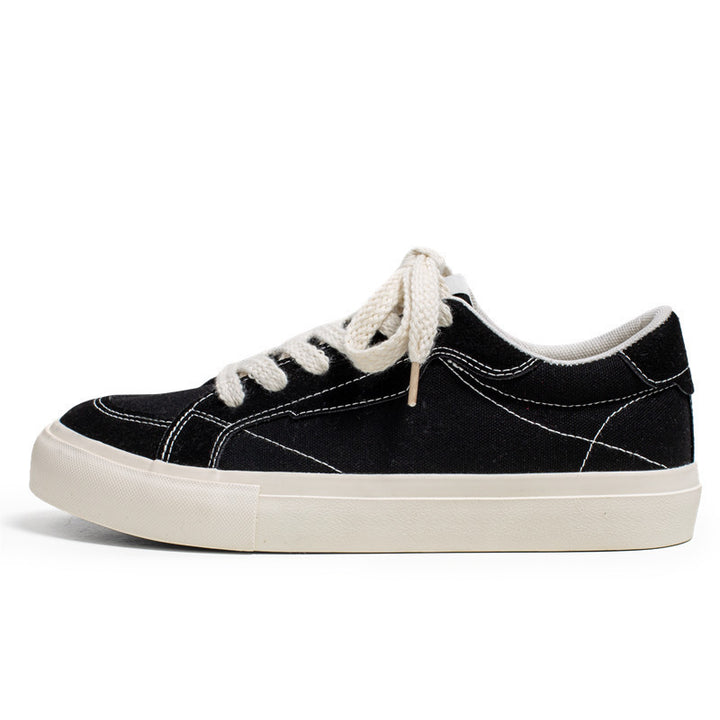 Unisex casual canvas low-top sneaker with contrasting decorative stitching and padded platform sole Mune Fashion