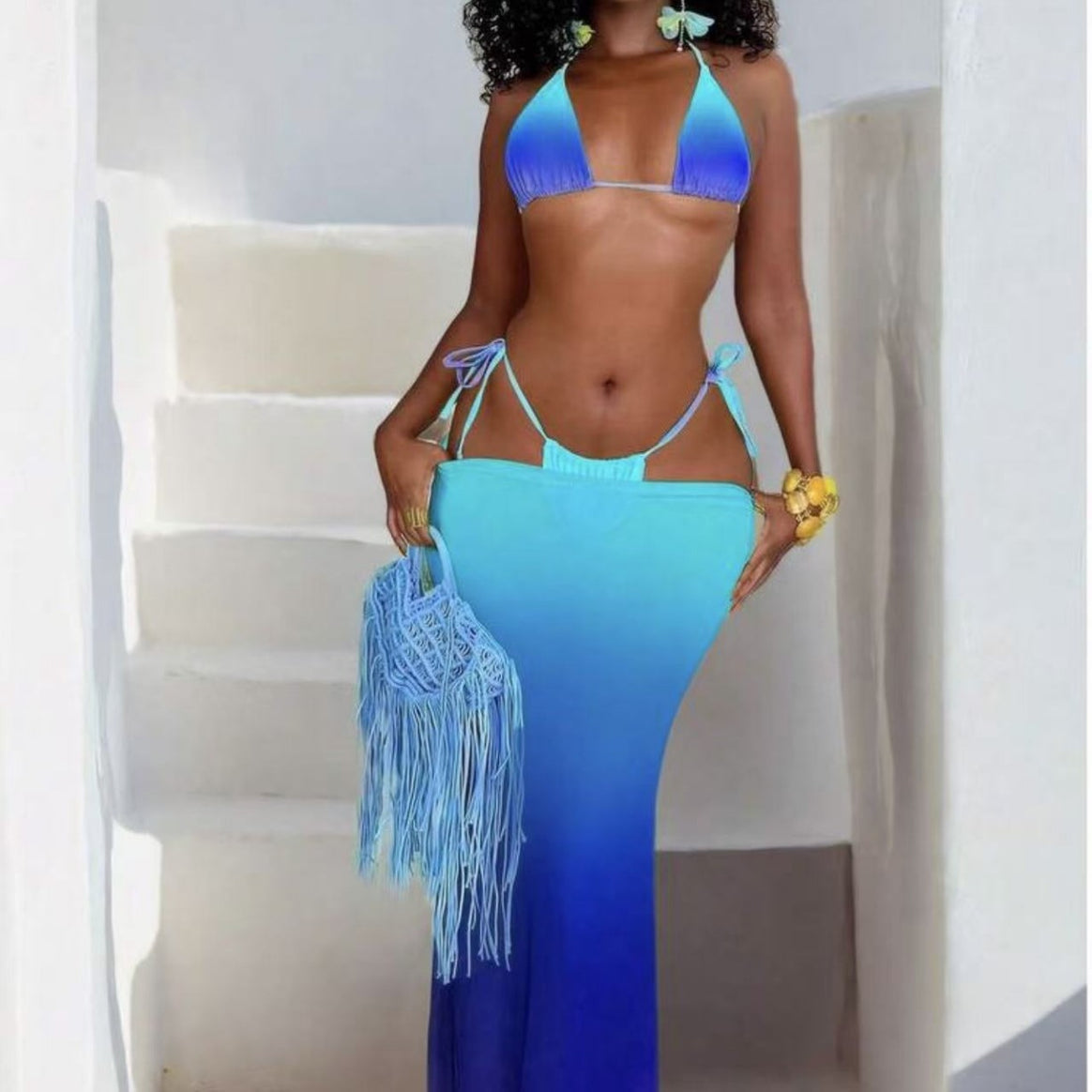 Women's bikini set with stylish lacing details and airy maxi dress overlay Mune Fashion