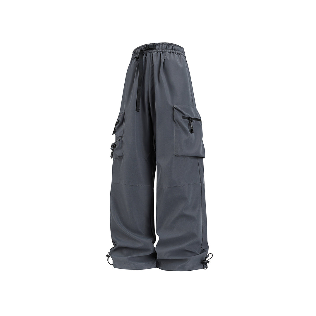 Men's loose technical cargo pants with multi-functional pockets, drawstring waistband, and adjustable leg closures Drune