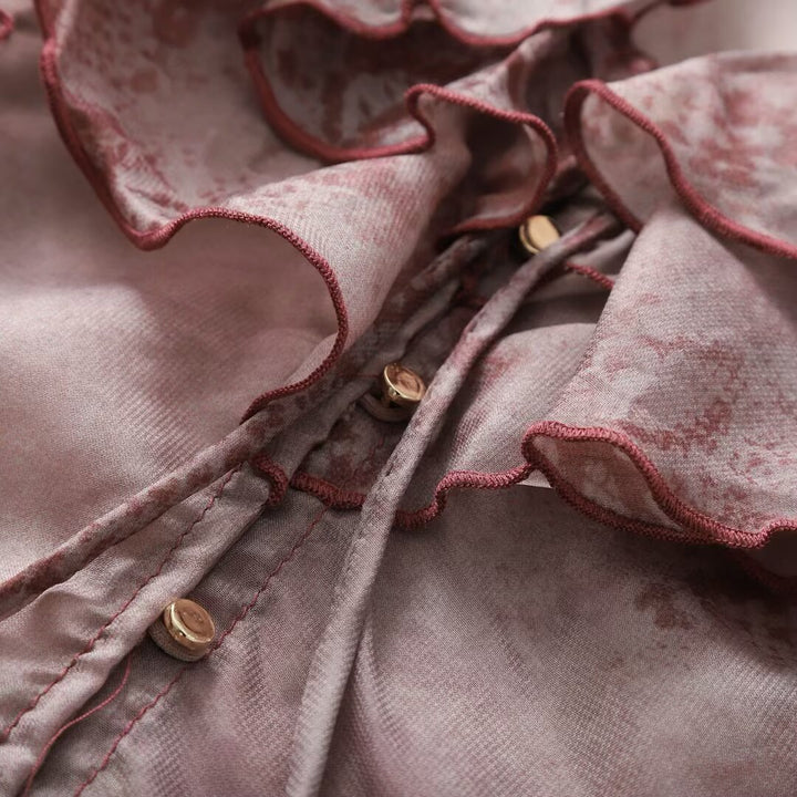 Women's chiffon blouse with ruffle collar, flounce sleeves, and decorative lacing Mune Fashion