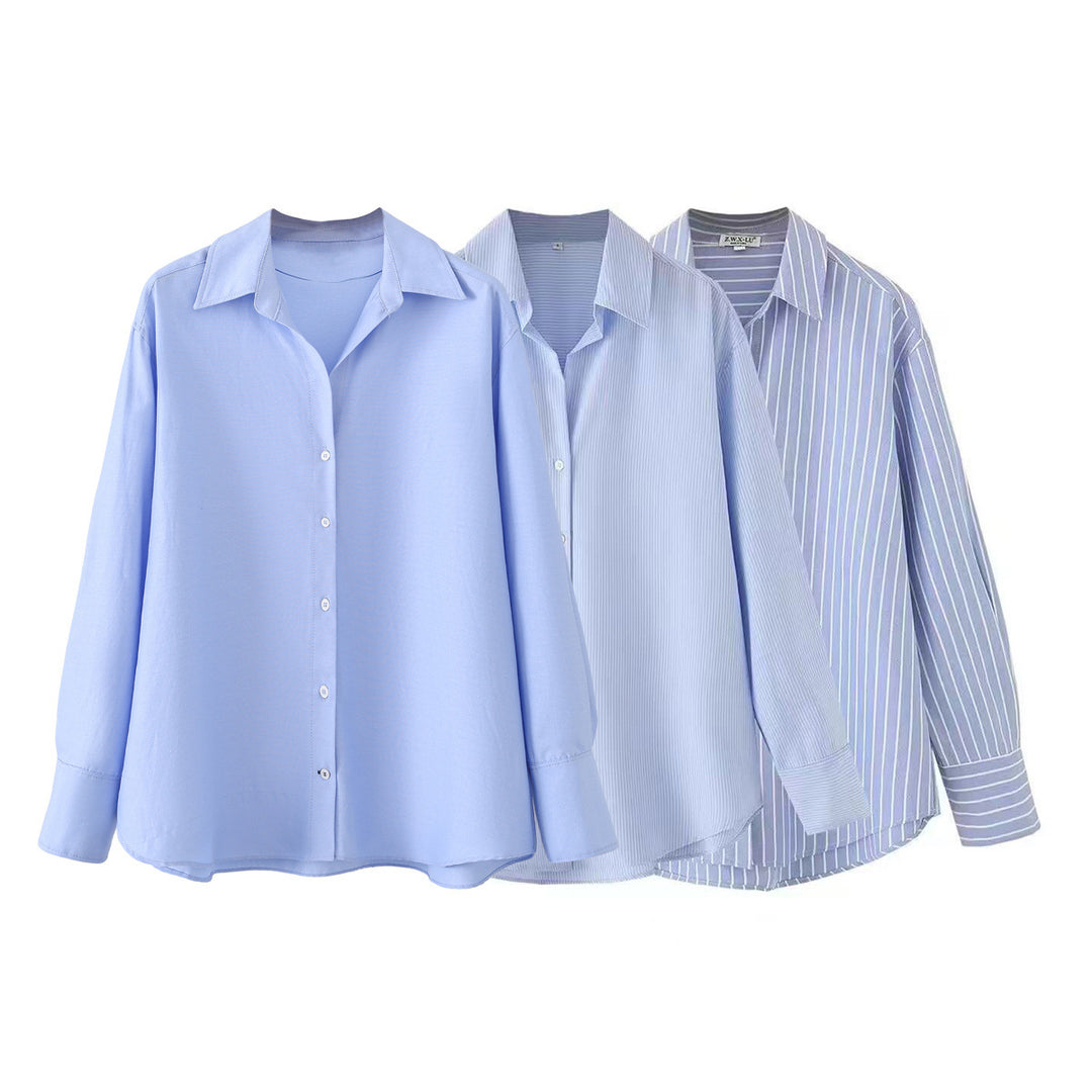Women's oversized shirt blouse with a wide cut, long cuffed sleeves, and rounded hem Mune Fashion
