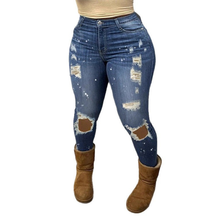 Women's high-waisted skinny super stretch jeans with used knee rips and paint splatter Mune Fashion