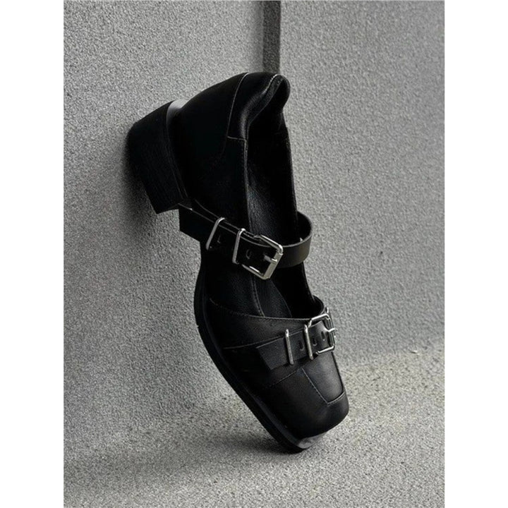 Ladies leather mules with buckle strap, pointed toe shape and studded embellishment Mune Fashion