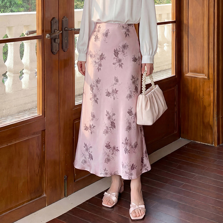 Women's high-waisted A-line midi skirt in jacquard-like satin with floral relief print.