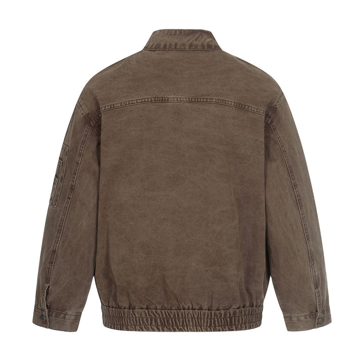 Men's short cut vintage-wash bomber jacket in boxy cut with stand-up collar and sleeve zip.
