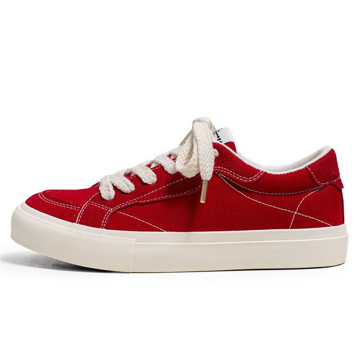 Unisex casual canvas low-top sneaker with contrasting decorative stitching and padded platform sole Mune Fashion