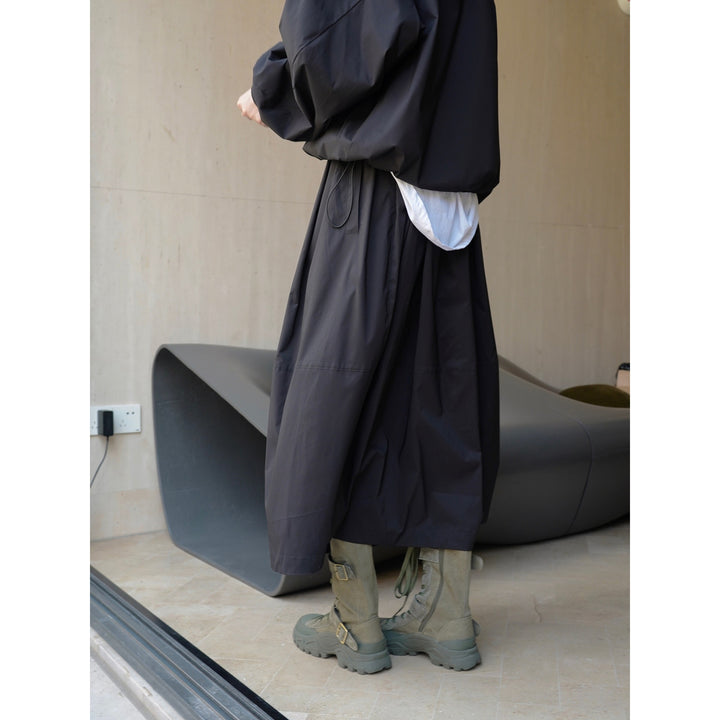 Women Longer Oversize Raincoat with concealed snap button placket and side pockets Mune Fashion