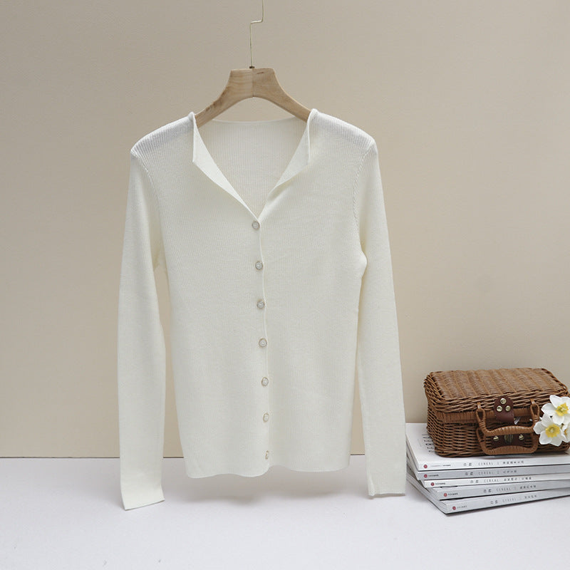 Women's light fine knit cardigan with open shirt collar and shimmering button placket Mune Fashion