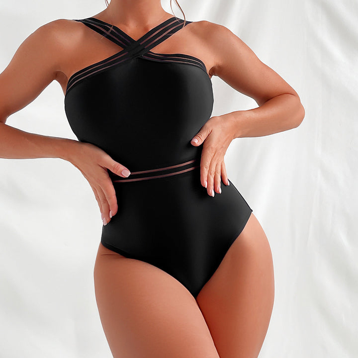 Ladies sporty jumpsuit with crossed straps and figure-flattering cut Mune Fashion