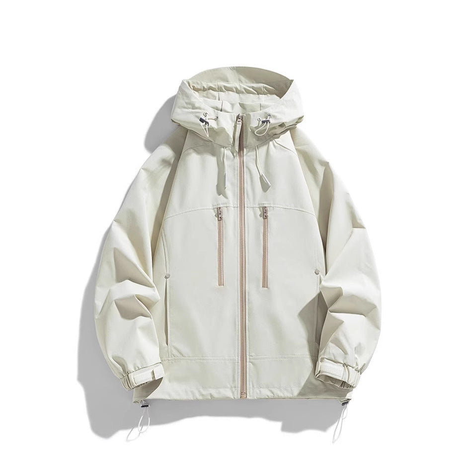 Unisex lightweight water-repellent hoodie jacket with two vertical zip chest pockets and adjustable hem Mune Fashion