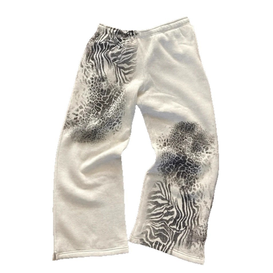 Women nan loose sweatpants with asymmetrical animal print, elastic comfort waistband and straight leg Mune Fashion