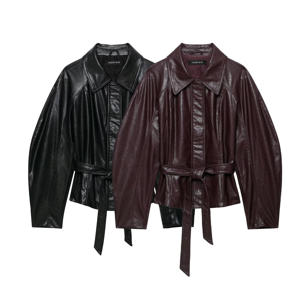 Women's short jacket made of vegan leather with a waist tie belt and dropped raglan sleeve construction Mune Fashion