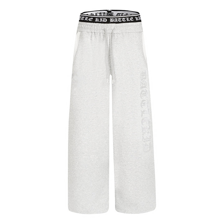 Women's wide lounge jogging pants with high logo waistband, gothic print and drawstring Mune Fashion