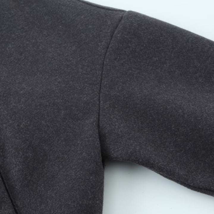 Women's short bomber-style jacket with stand-up collar, snap button placket, and elastic hem Mune Fashion