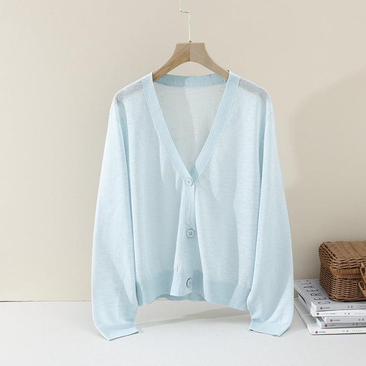 Women's Lightweight Oversized Cardigan made of fine knit with deep V-neck and decorative button placket Mune Fashion
