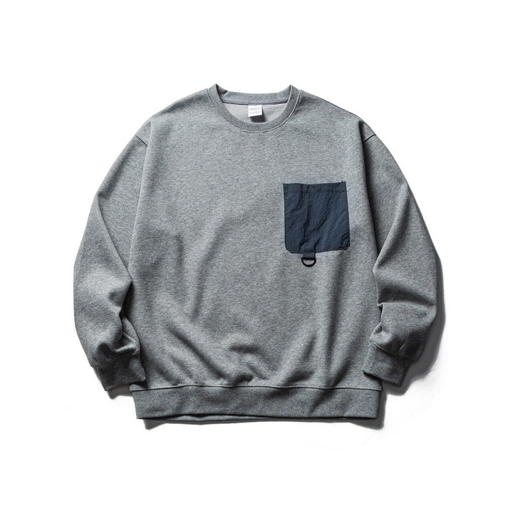 Unisex Oversize Sweatshirt with contrasting chest pocket and D-ring Mune Fashion