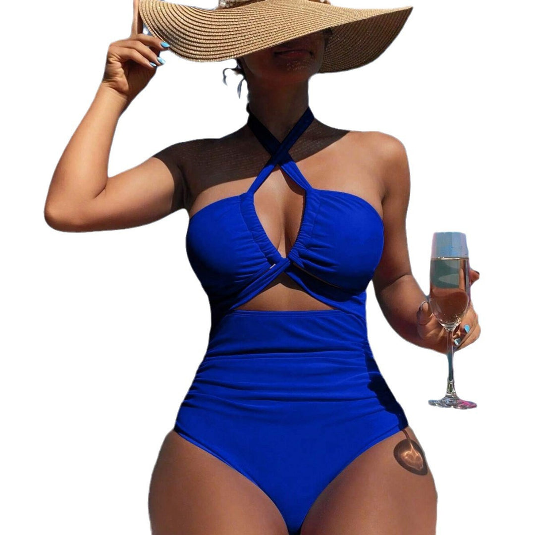 Women's one-piece swimsuit with innovative cut-out design and playful bow band Mune Fashion