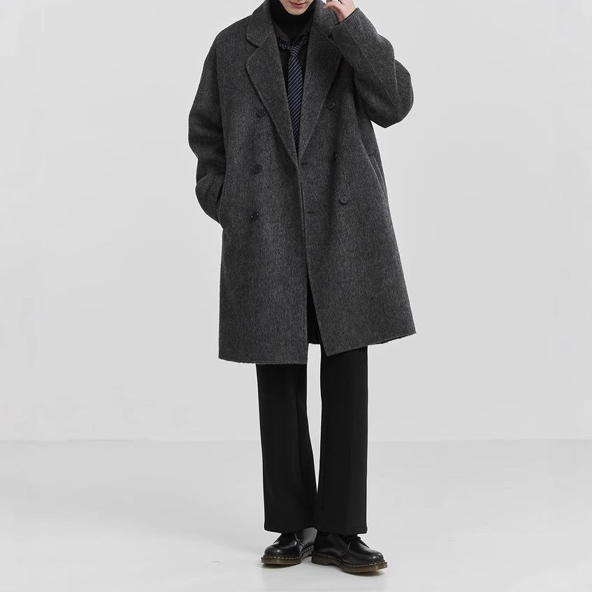 Men's oversized double-breasted wool coat with notched lapels and patch pockets Mune Fashion