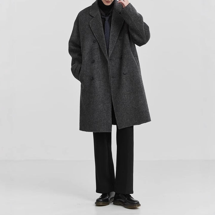 Men's oversized double-breasted wool coat with notched lapels and patch pockets Mune Fashion