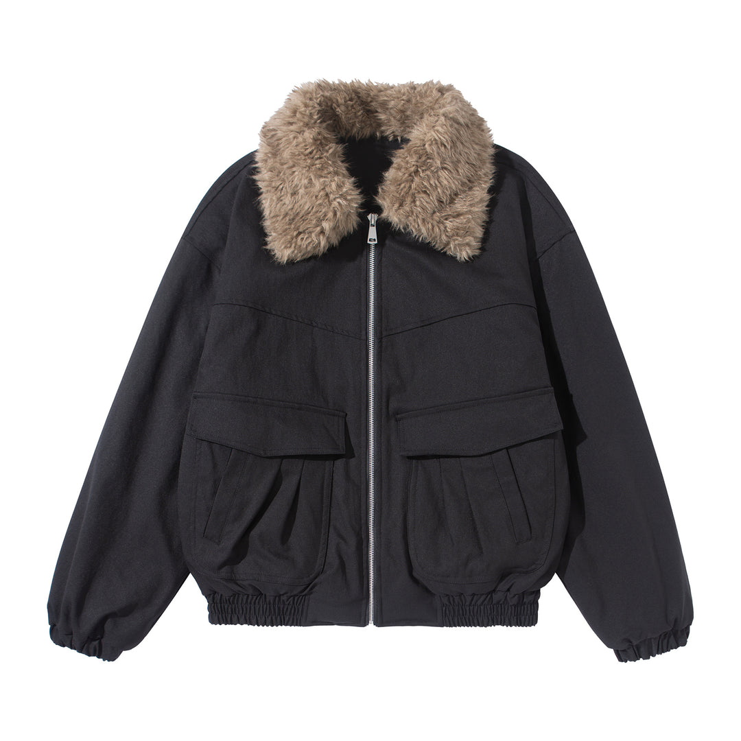 Women's short jacket with voluminous faux fur collar, kangaroo pockets, and elastic hem Mune Fashion