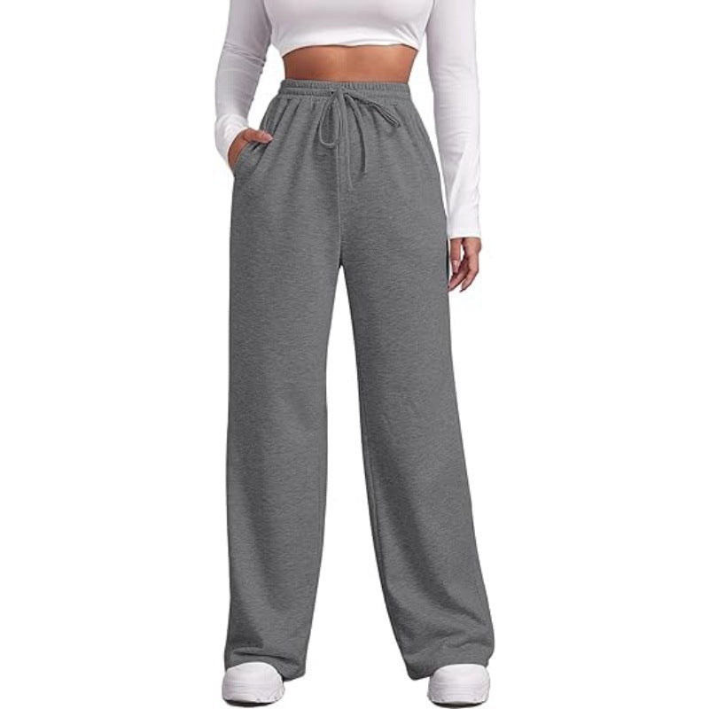 Women's flowing Relax palazzo pants with high comfort waistband, drawstring and side slip pockets Mune Fashion