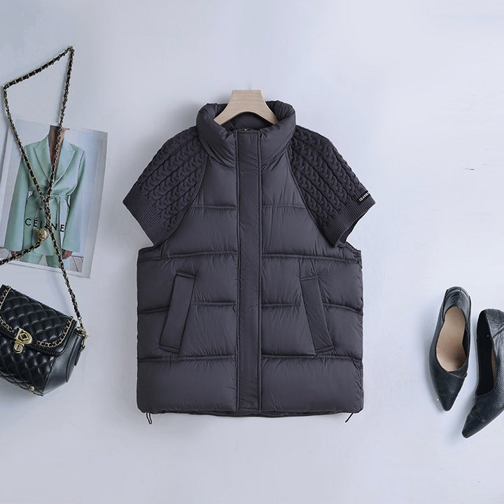 Women's short padded quilted vest with short-sleeved cable knit shoulder section and high-closing stand-up collar Mune Fashion