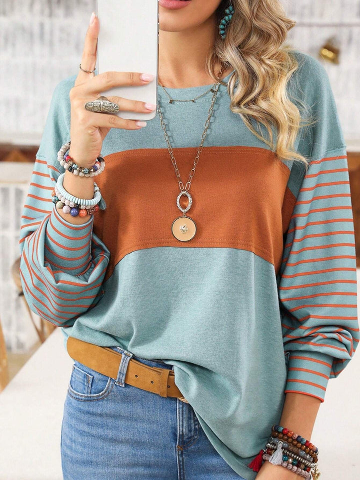 Women's Loose Colorblock Sweatshirt with Striped Sleeves and Round Neck Mune Fashion