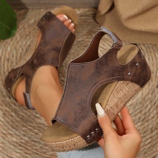 Women’s wedge sandals with heel strap, ergonomic footbed, cork look platform, and padded toe area Mune Fashion